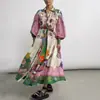 Roupas femininas transfronteiriças europeias e americanas de 2026: Vestido longo estampado solto de cintura alta, artístico, vintage, moderno, para o dia a dia e apropriado para o trabalho