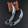Juego Periférico Juguete de Metal Dragón Dorado de Cinco Garras Dientes Venenosos Luna Oscura Doble Punta Garra de Aleación Modelo Arma Giratorio