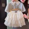 Traje de Verano para Niñas Dulce 2025 Preppy Nuevo Moda de Verano de Manga Corta para Niños Falda de Pastel Conjunto de Dos Piezas