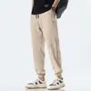 Pantalones Casuales de Verano para Hombre, Nuevos de Seda de Hielo Ligeros Transpirables Versátiles Holgados Casuales de Nicho Jogger Pantalones de Nueve Puntos