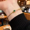Pulsera Dorada Apilable Estilo Coreano Popular con Piedra Verde Transfronteriza para Mujer, Lujo Ligero, Sensación de Gama Alta, Pulsera Abierta Versátil al por Mayor
