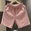 Shorts Esportivos Masculinos de Secagem Rápida Novos para o Verão de 2026, Corte Solto, Marca Tendência, Shorts Casuais Versáteis de Cor Sólida para Jovens
