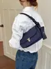 Bolso de axila popular de nicho minimalista coreano Dongdaemun, bolso de diseño de nicho popular transfronterizo primavera-verano, bolso de mujer para el trabajo