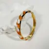 Yongge Jewelry Pulsera de Esmalte Transfronteriza Europea y Americana para Mujer Moderna Colorida Geométrica Rayada de Puntos Filigrana con Borde Dorado Accesorio de Mano