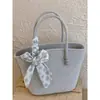 Bolsa de Cesta Estilo Vacaciones Suave y Dulce Primavera/Verano 2026, Bolso de Hombro Cruzado de Textura de Alta Gama Estilo Coreano de Nicho