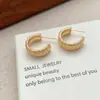 Pendientes geométricos en forma de C para mujer, diseño de nicho estilo ins, estilo europeo y americano, pendientes elegantes, accesorios para orejas personalizados de moda y exquisitos