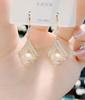 Pendientes 2022, nuevos y elegantes, de moda, con diseño de gancho para la oreja de perla, con diamantes huecos y llenos de diamantes, joyería para la oreja
