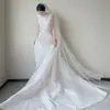 Fotografía de viaje vestido de novia 2026 modelo nuevo, vestido de recepción nupcial simple y elegante con una cola pequeña texturizada para salidas