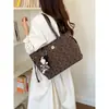 Bolso de mano elegante y de alta gama de gran capacidad para mujer, nueva colección 2026, adecuado para el trabajo diario, con diseño de lunares y rayas, y se puede llevar como bolso de hombro o bolso tote