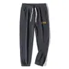 Pantalones de pana para hombre de primavera y otoño, pantalones deportivos, pantalones de chándal para hombre, holgados y versátiles, pantalones casuales de retazos, pantalones jogger, pantalones largos