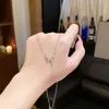Collar de Acero de Titanio de Lujo Ligero de Nicho de Gama Alta Cadena para Clavícula Exquisita con Circonita Microincrustada Moda Versátil Temperamento Celebridad de Internet Gargantilla