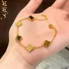 Joyería de Cobre Chapado en Oro de Alta Calidad que Conserva el Color, Pulsera de Trébol de Cuatro Hojas con Diamante Rojo de Alta Gama Estilo Palacio, Joyería de Mariposa Tridimensional Estilo Chino Nuevo