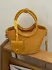 Bolso pequeño vintage de alta gama para mujer, nuevo bolso cruzado versátil de moda 2026, bolso de mano exquisito y súper popular, bolso tipo cubo