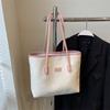 Bolso de gran capacidad para mujer, nuevo bolso de hombro de verano 2024, ideal para estudiantes universitarios, bolso de mano versátil para ir al trabajo.