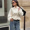 Jaqueta jacquard de cor sólida com padrão escuro estilo francês para mulheres, novo estilo com gola lapela, zíper, cintura com amarração, mangas compridas e mangas bufantes