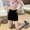 Falda corta de mezclilla versátil de línea A, ajustada, de cintura alta, con forma de pera, para mujeres de talla grande para mostrar piernas largas, falda midi ajustada para la cadera, ropa exterior para mujer