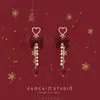 Pendientes de Bola de Pelo con Lazo Flocado Rojo de Año Nuevo Pendientes de Nicho de Gama Alta Pendientes de Nicho de Gama Alta para Boda de Año Nuevo