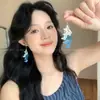 Pendientes de circón ultrabrillantes populares de TikTok para mujer, pendientes de nicho de lujo ligero de alta gama, elegantes y geniales, populares en línea, exquisitos clips para orejas