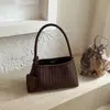 Nuevo Bolso de Mimbre Tejido Francés 2026 Bolso Coreano para Hombro Textura de Alta Calidad Temperamento de Nicho Bolso de Hombro Versátil para Mujer