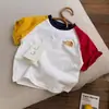 Camiseta de manga corta de algodón puro para niños y niñas, 2026 a rayas bordada nueva marca moderna versátil top de ropa infantil para verano