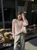 Cárdigan rosa de cachemir para mujer, de estilo suave y relajado, con cuello cepillado, cierre de botones y una mezcla de lana y seda de morera.