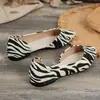 Zapatos planos únicos con estampado de cebra, corte lateral y punta fina, con suelas suaves, tela transpirable, diseño de corte bajo, adecuados para el uso diario en primavera y otoño.
