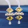 Pendientes de plata S925 con diseño de lazo de amor, de estilo pequeño, de lujo y con combinación de circonitas amarillas, para mujer