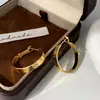 Pendientes de Aro Minimalistas Versátiles de Lujo Ligero de Alta Gama con Textura, de Diseño Único y Artesanía Exquisita, Transfronterizos Europeos y Americanos