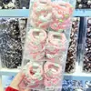 Pacote com 2 Fofos Elásticos de Cabelo Transparente de Coelho Morango Rosa Estilo Primavera para Alunos do Ensino Fundamental