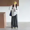 Conjunto de outfit de otoño para niñas 2026 nuevo elegante y moderno camiseta de manga larga y pantalones casuales a rayas para niñas mayores, colección de otoño