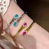 Pulsera de Corindón Rojo Vintage Dorada con Diseño de Lágrimas Azules, Incrustada con Paraíba, Pulsera de Apertura de Resorte para Mujer