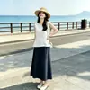 Conjunto de Verano Francés de Alta Gama para Mujer: Top sin Mangas de Lino Lyocell + Falda 100% Lyocell