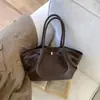 Bolso cubo versátil transfronterizo para mujer, nuevo y moderno de la versión coreana de principios de otoño, bolso de mano/hombro exquisito y elegante para el día a día