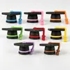 Suministro exclusivo transfronterizo de tapas para bolígrafos de gorro de graduación de goma suave de PVC, regalos de temporada de graduación de dibujos animados, venta directa del fabricante