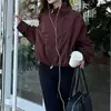 Chamarra cortavientos corta holgada de estilo coreano con hombros descubiertos, versátil para ir al trabajo y protección solar.
