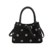 Bolso de mano de lunares de moda estilo coreano, bolso tipo cubo de PU para mujer, nuevo modelo 2026, bolso de hombro y cruzado de moda para el día a día.