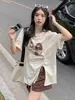 Camiseta Curta com Cordão e Fenda Estilo Coreano Feminina Verão 2024 Solta Tendência Design Ins com Senso de Design Top Irregular de Meia-manga