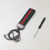Chaveiro de Metal para Carro com Fita Colorida Pingente Decoração Atacado Decoração de Presente Acessórios Fábrica Atacado Pacote Pequeno