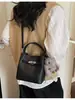 Bolso Cubo Simple y Elegante para Mujer 2026 Nuevo Bolso de Hombro Retro de Nicho Bolso Cruzado Casual para el Día a Día