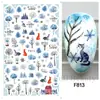 Adesivos de nail art novos e transfronteiriços, com designs de desenhos animados com tema de Natal e inverno, incluindo Papai Noel, dinossauros e renas, com verso adesivo