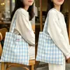 Bolso tote de estilo coreano, suave y femenino, a cuadros rosas y blancos con lazo bordado, un bolso de hombro elegante y versátil adecuado para el trabajo y los desplazamientos