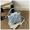 2026 Nuevo Bolso de Hombro Único de Lujo Ligero para Mujer Diseño de Nicho Bolso de Mano Moderno Bolso Cruzado Bolso Cuadrado Pequeño Texturizado