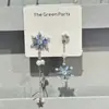 Pendientes Asimétricos de Copo de Nieve Azul Hielo con Borlas para Otoño e Invierno Diseño de Nicho Estilo de Alta Gama Nuevos Clips para Orejas