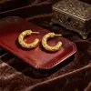 Brincos de Argola C com Textura de Ouro Quebrado, Estilo Commuter Europeu e Americano, Item Quente de Vendas Transfronteiriças, Galvanoplastia Patenteada, Marca de Designer Mesurely