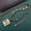 Collar Xizang Pintado a mano Oro Cinco Maestros Ocho Deidades Patronas Doble cara Tridimensional Colgante Thangka Collar Tejido a mano