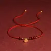Suministro directo de fábrica pulsera al por mayor tejida a mano cuerda de mano de cinabrio de año de nacimiento natural cuerda de mano joyería estilo nacional de loto
