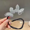 Herramienta para peinar moños despeinados Palo para el pelo de mariposa 2026 Modelo Nuevo Parte trasera de la cabeza Accesorio para el pelo de moño de hortensia