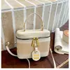 Bolso de mujer nuevo 2026 verano moderno nicho bandolera casual bolso cruzado de moda simple bolso de mano bolso tipo cubo