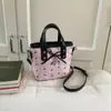 2025 Nueva Moda Lazo Color de Contraste Casual Casual Gran Capacidad Bolso de Hombro Cruzado Bolso Cubo Bolso de Mano Mujer