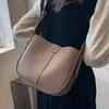 Bolsa Pequena Versátil Transfronteiriça para Mulheres Moda Nova Primavera/Verão 2026 Bolsa de Ombro Único Transversal Bolsa Saco Retrô para o Dia a Dia
